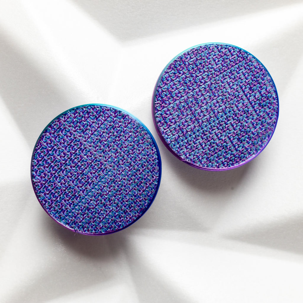 two colored earrings with textured surface for non pierced ears