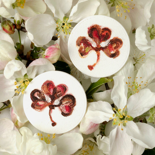 Two white lightweight earrings with oil painted colorful nature elements - flowers, bugs, butterflies. 