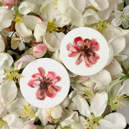 Two white lightweight earrings with oil painted colorful nature elements - flowers, bugs, butterflies. 
