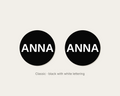 Pair of 42mm black custom text earrings reading ANNA in white Classic lettering