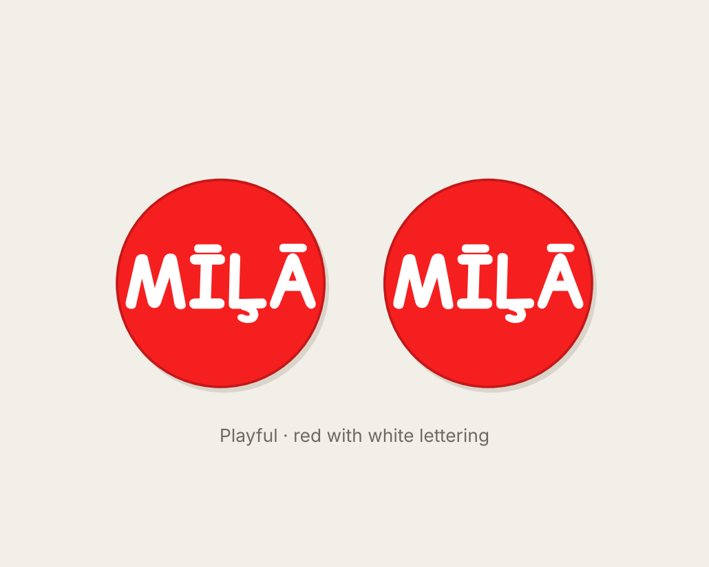 Pair of 42mm red custom text earrings reading MILA in white Playful lettering