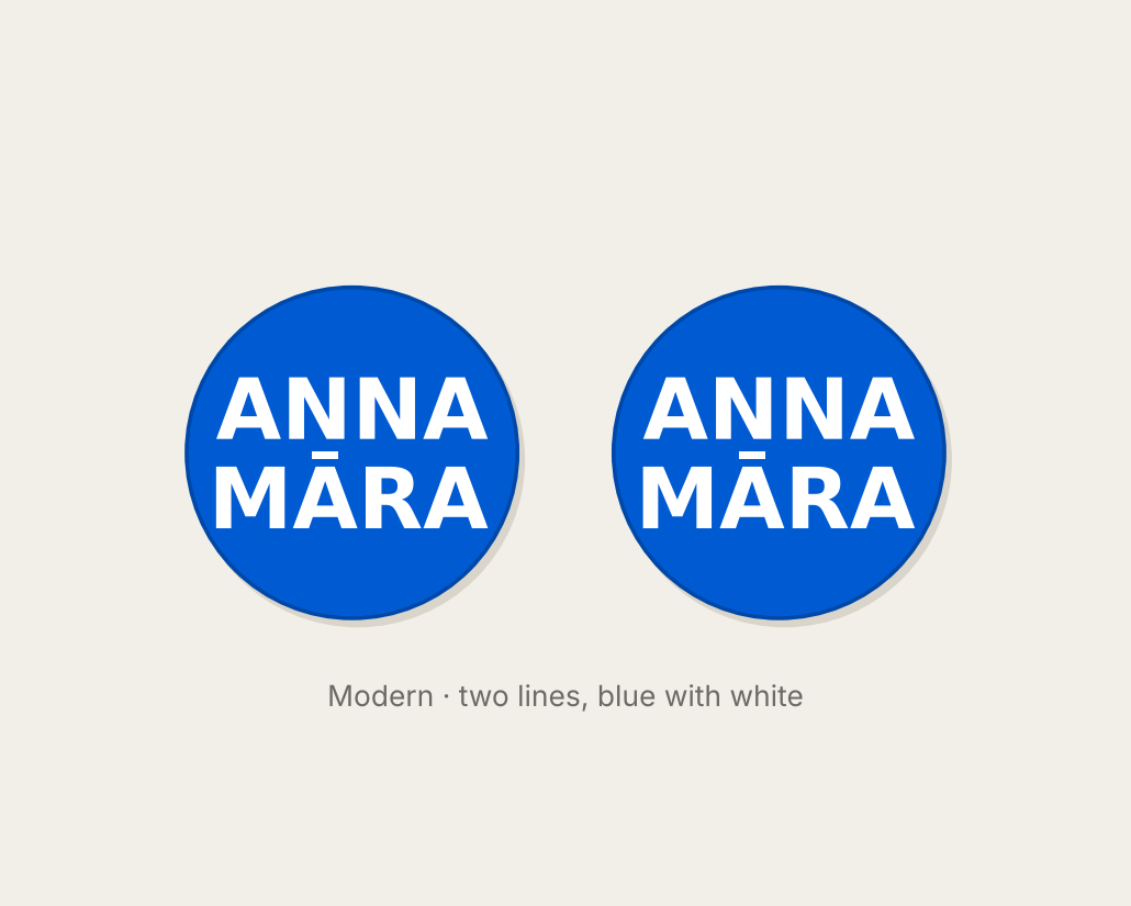 Pair of 42mm blue custom text earrings with two lines of white Modern lettering