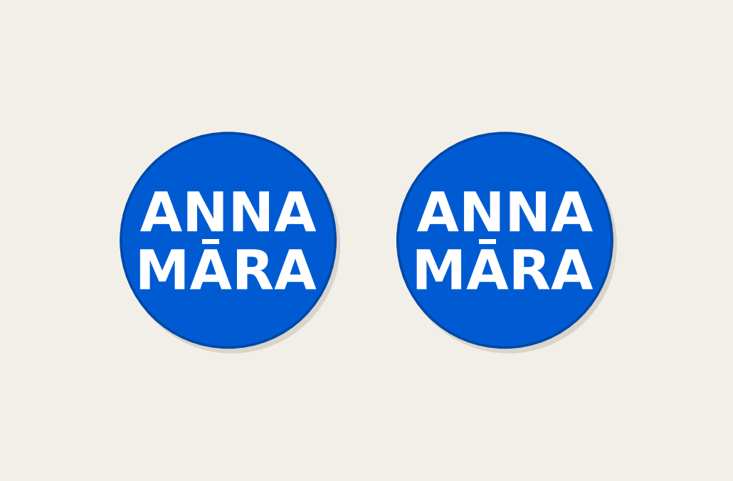 Pair of 42mm blue custom text earrings with two lines of white Modern lettering